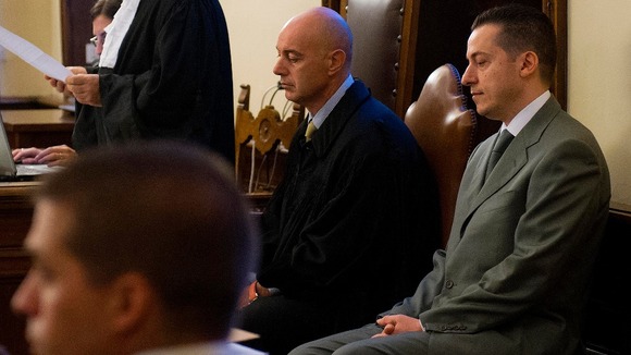 Pope Benedict's former butler Paolo Gabriele (right) at the start of his trial at the Vatican.