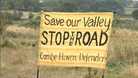 Protester's banner against the link road