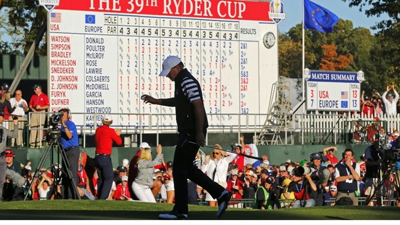 U.S. golfer Stricker walks off the 18th green after losing his match to Team Europe golfer Kaymer