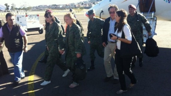 The rescued women appeared in a photo tweeted by Ecuador's Interior Ministry
