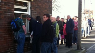 Customers queueing