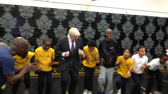 London Mayor Boris Johnson (left) with gold medallist Mo Farah.