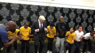 London Mayor Boris Johnson (left) with gold medallist Mo Farah.
